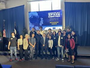 Photo of Jose Hernandez and a group of students